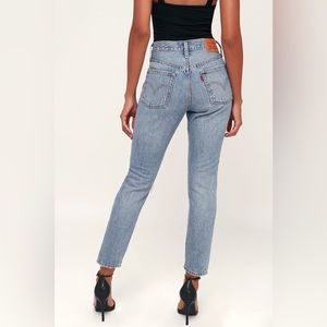 Levi’s 501 light wash high waisted straight leg distressed denim